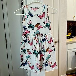 Girls sleeveless butterfly dress. Size 8-10y